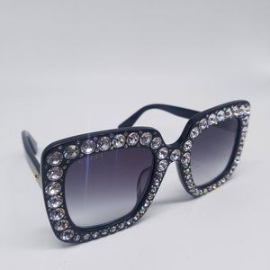 Gucci GG0148 S 001 Sunglasses Crystal Black Frame